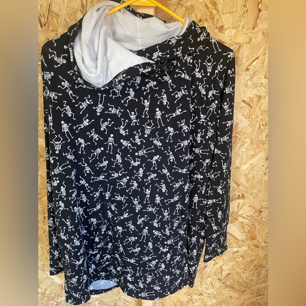 Lularoe large hoodie skeletons Halloween. Has some fuzz